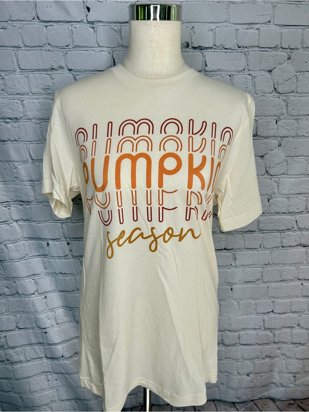 Bella Canvas Cream Pumpkin Season Graphic Tee in Orange and Brown